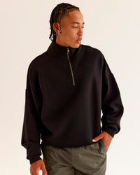 Man wearing AfterDark ZeroCrease Quarter Zip - Black | Model:Malebo | Size:M | Thumbnail Index: 1