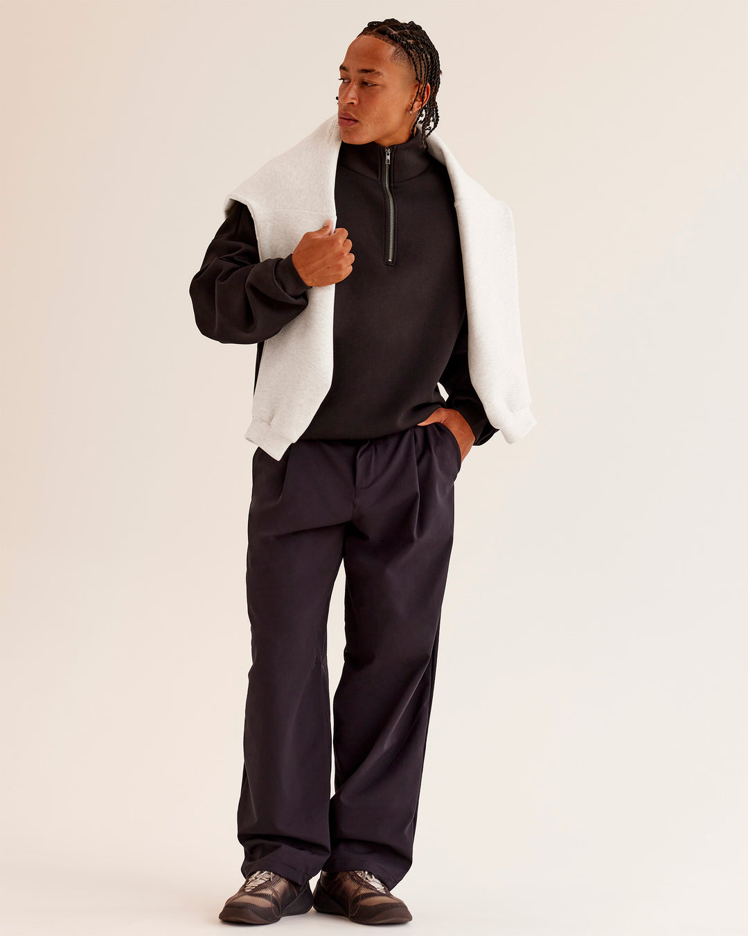 Man wearing AfterDark ZeroCrease Quarter Zip - Black | Model:Malebo | Size:M - view 3