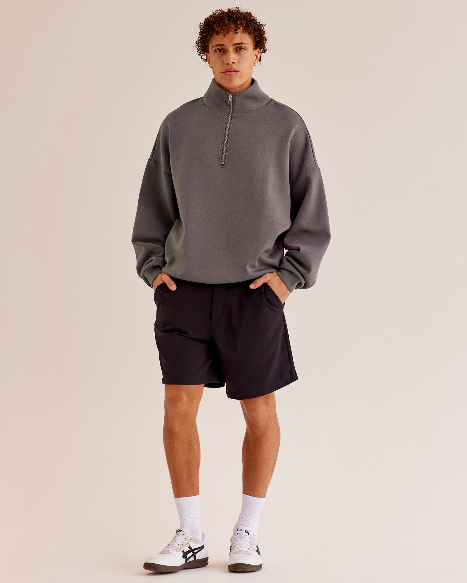 Man wearing AfterDark ZeroCrease Quarter Zip - Duskstone | Model:Leandro | Size:M