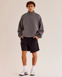 Man wearing AfterDark ZeroCrease Quarter Zip - Duskstone | Model:Leandro | Size:M | Thumbnail Index: 1