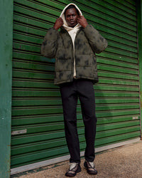 Man wearing Base Puffer Jacket - Camo Washed Walnut Grey | Model:Mabyro | Size:M | Thumbnail Index: 3