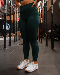 Woman wearing Fusion Ultra High-Rise Full Length Legging Pockets - Dark Moss | Model:Gloria | Size:M | Thumbnail Index: 2