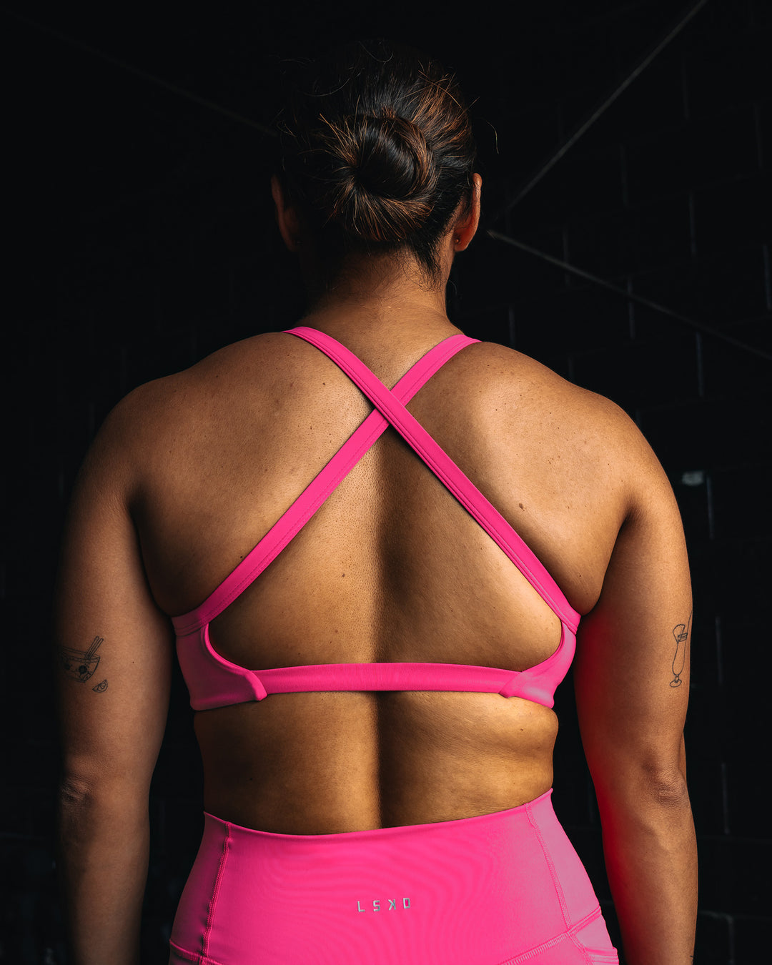 Woman wearing Inspired Sports Bra - Ultra Pink | Model:Tiare | Size:M - view 7