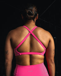 Woman wearing Inspired Sports Bra - Ultra Pink | Model:Tiare | Size:M | Thumbnail Index: 6