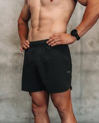 Man wearing Lift 6" Short - Pirate Black | Model:| Size:M | Thumbnail Index: 5