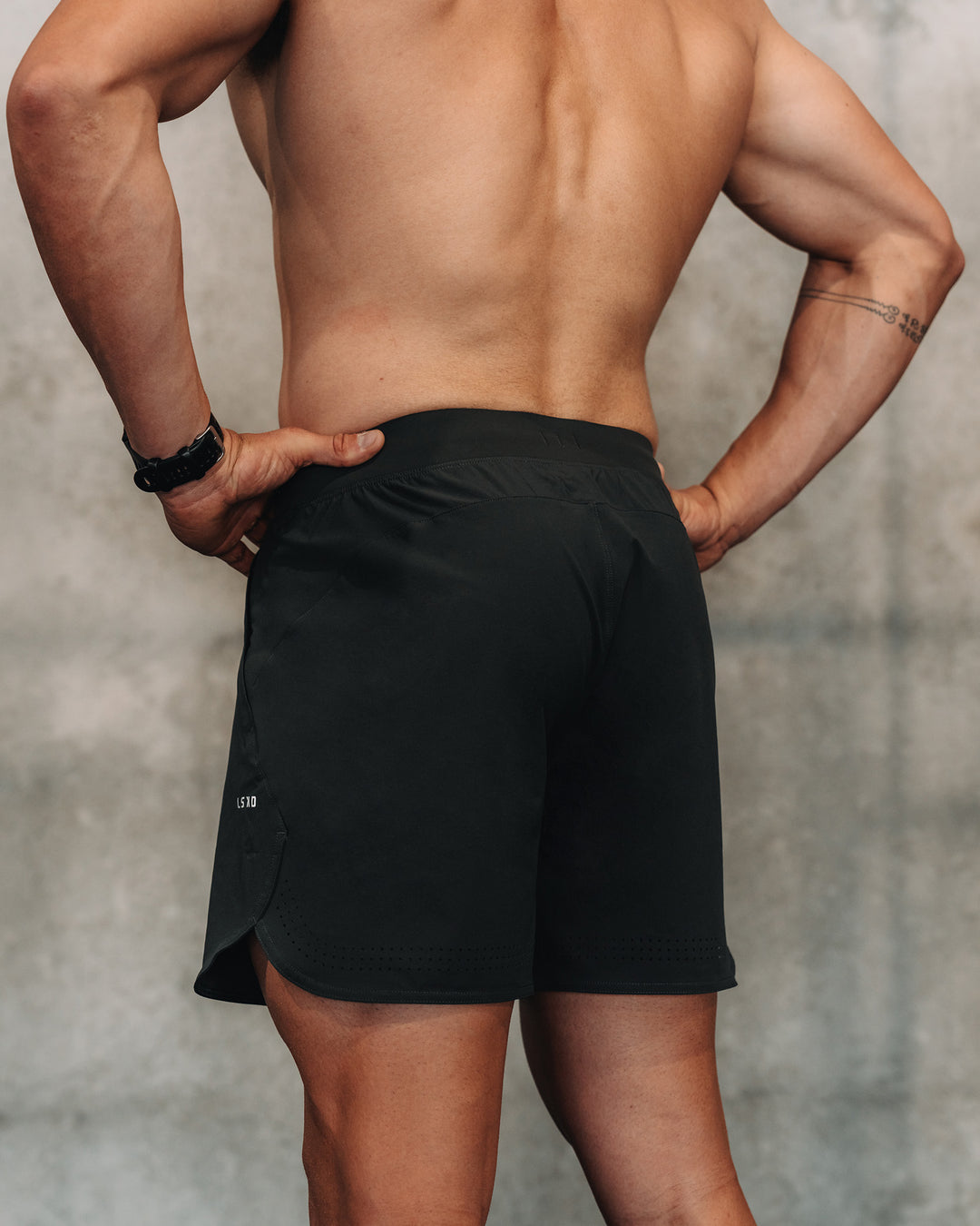 Man wearing Lift 6" Short - Pirate Black | Model:| Size:M - view 9