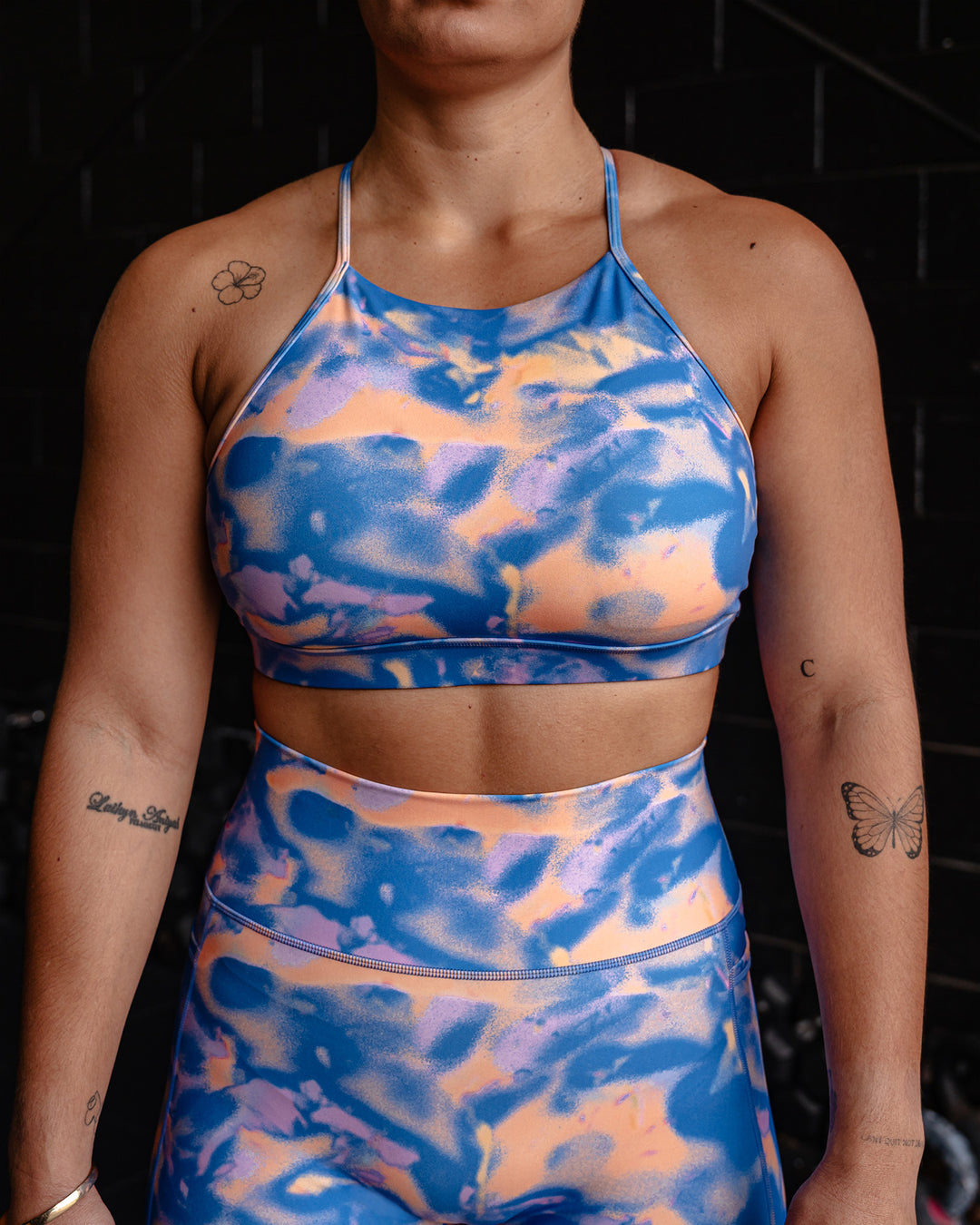 Woman wearing Lift High Neck Sports Bra - Apricot Mist | Model:Tiare | Size:M - view 6