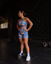 Woman wearing Lift High Neck Sports Bra - Apricot Mist | Model:Tiare | Size:M | Thumbnail Index: 2