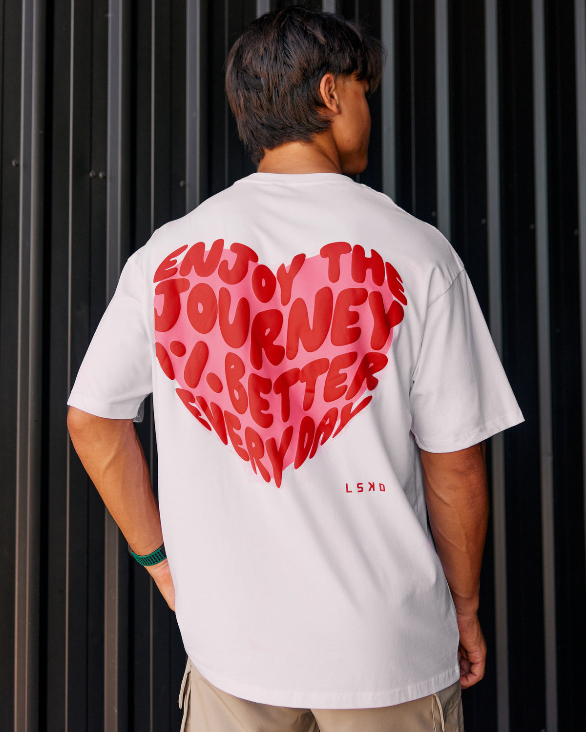 Man wearing Love the Journey FLXCotton Oversized Tee - White-Candy Pink | Model:George | Size:M