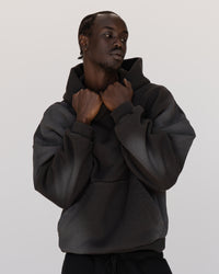 Man wearing Memory In Motion 500gsm Ultra Heavyweight Washed Hoodie - Charcoal Washed | Model:Okello | Size:M | Thumbnail Index: 3