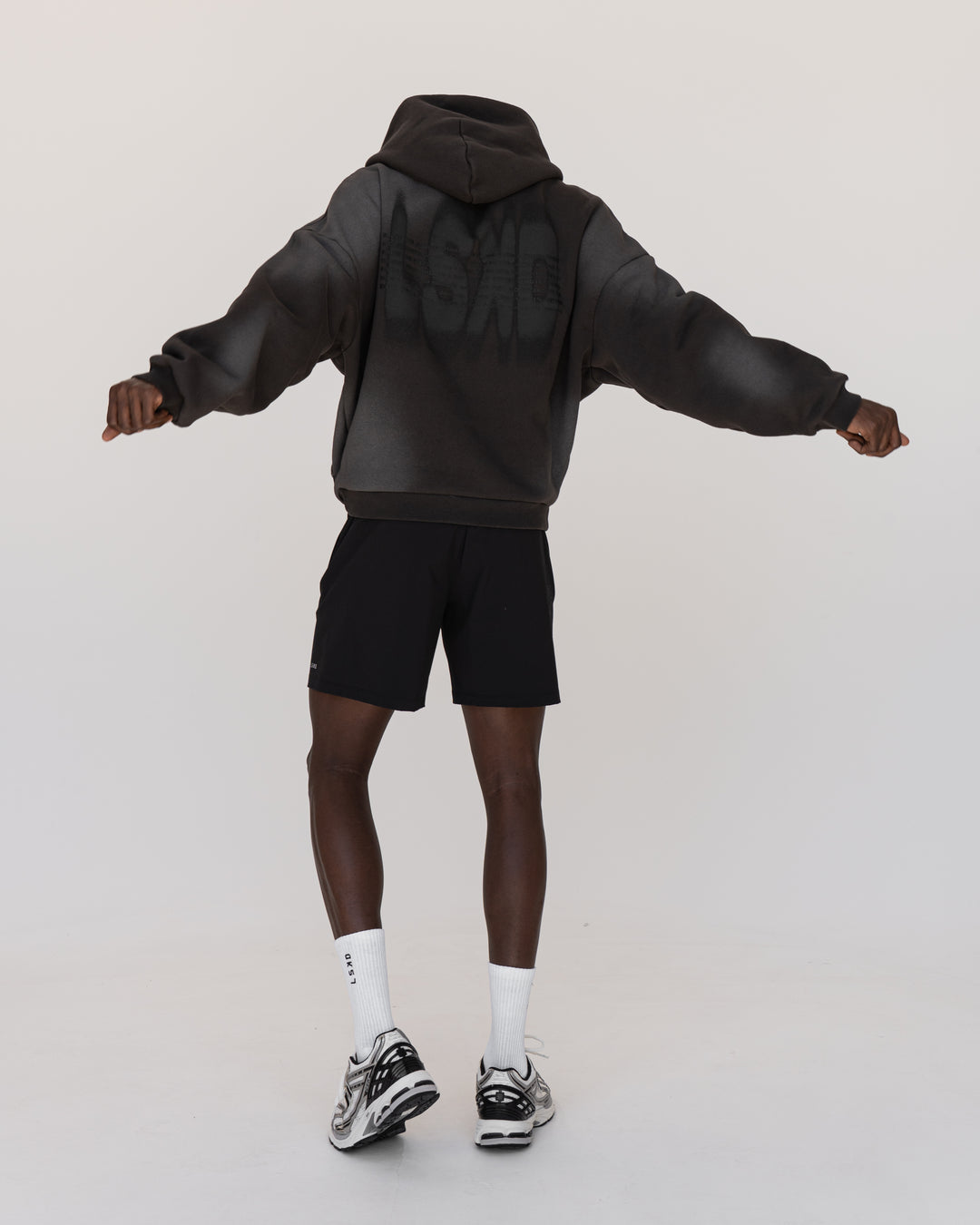 Man wearing Memory In Motion 500gsm Ultra Heavyweight Washed Hoodie - Charcoal Washed | Model:Okello | Size:M - view 18