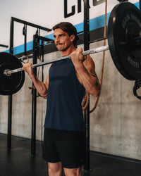 Man wearing AeroFLX+ Seamless Muscle Tank - Navy/Navy | Model: | Size:M | Thumbnail Index: 4