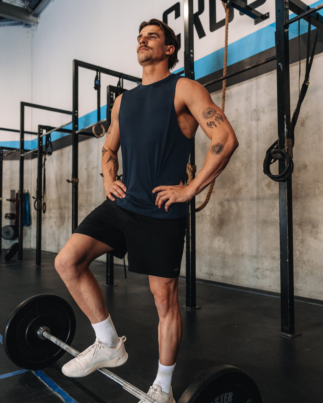 Man wearing AeroFLX+ Seamless Muscle Tank - Navy/Navy | Model: | Size:M - view 7