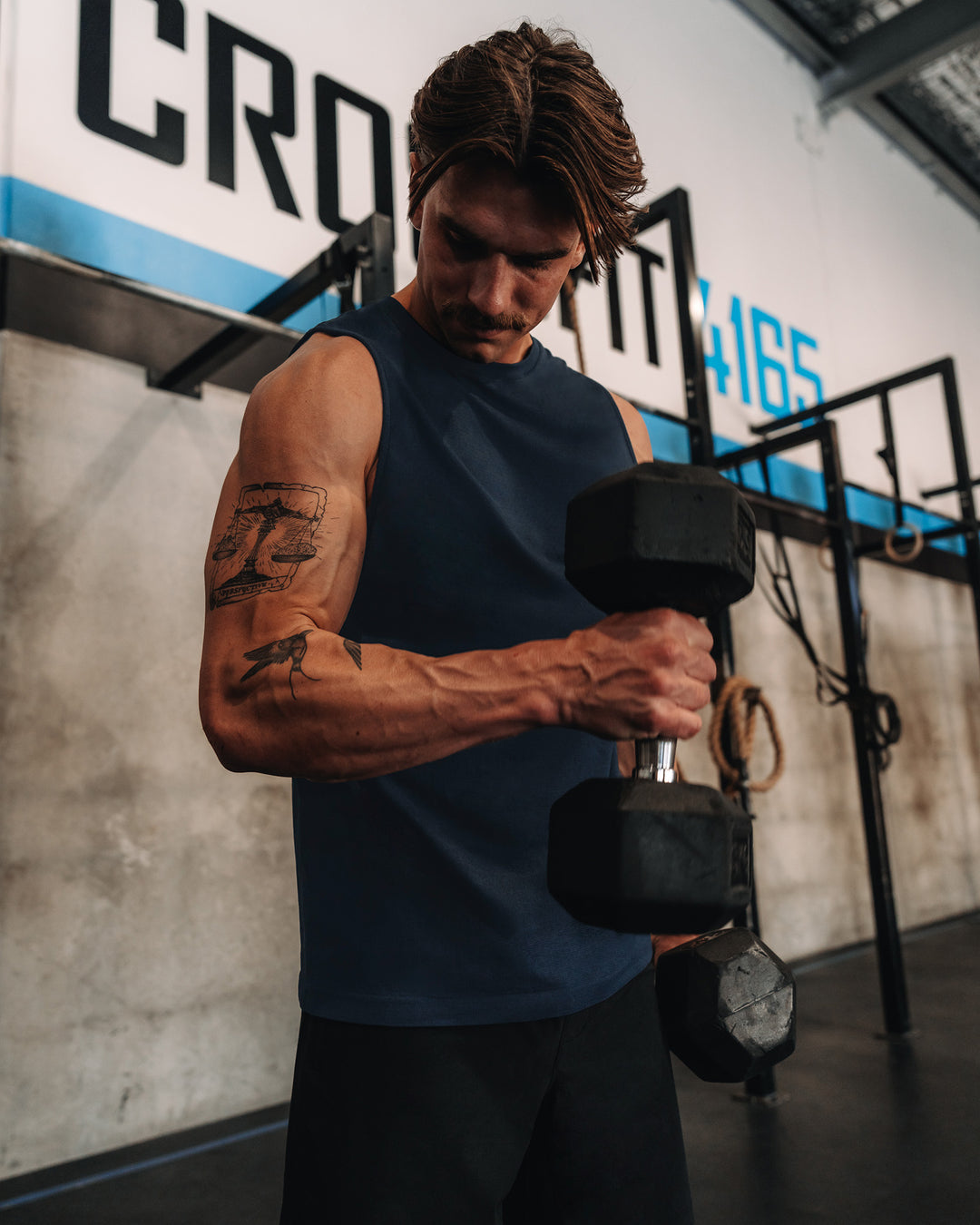 Man wearing AeroFLX+ Seamless Muscle Tank - Navy/Navy | Model: | Size:M - view 9