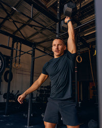 Man wearing AeroFLX+ Seamless Tee - Black Marl | Model:Jaiden | Size:M | Thumbnail Index: 1