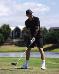 Man wearing Drive Polo - Black | Model:Jarrod | Size:M | Thumbnail Index: 1