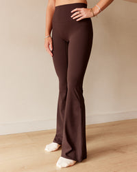 Woman wearing Peaches Elixir High-Rise Flared Pant - Hot Chocolate | Model:Dani | Size:M | Thumbnail Index: 0