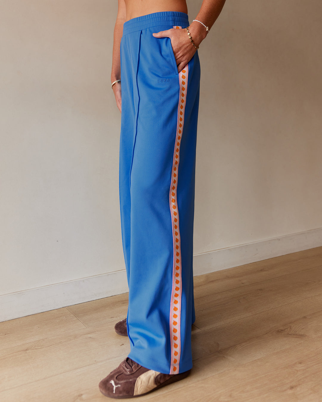 Woman wearing Peaches Track Pant - Palace Blue | Model:Dani | Size:M - view 10