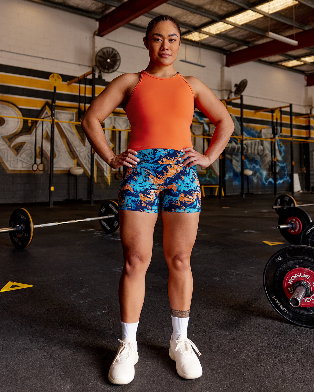 Woman wearing Power Performance Tank - Ultra Orange | Model:Vana | Size:M - view 4