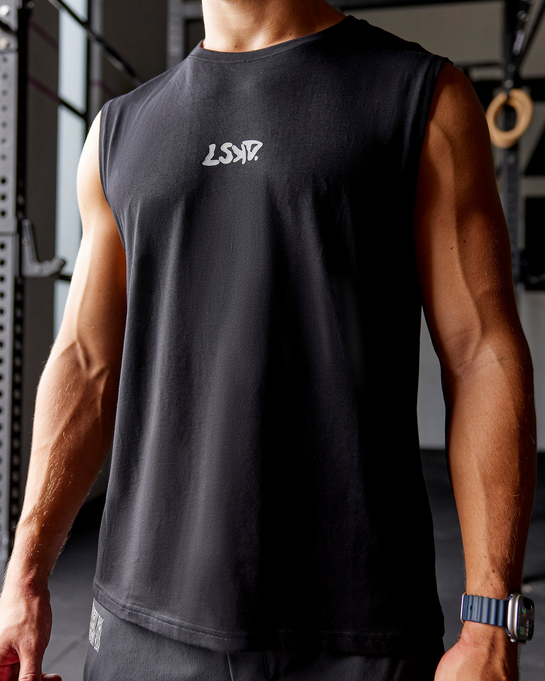 Man wearing Static Grit FLXCotton Tank - Black | Model:Jaiden | Size:M - view 1