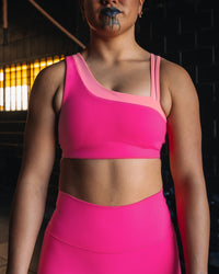 Woman wearing Thrive Asymmetric Sports Bra - Ultra Pink-Candy Pink | Model:Teraipine | Size:M | Thumbnail Index: 6
