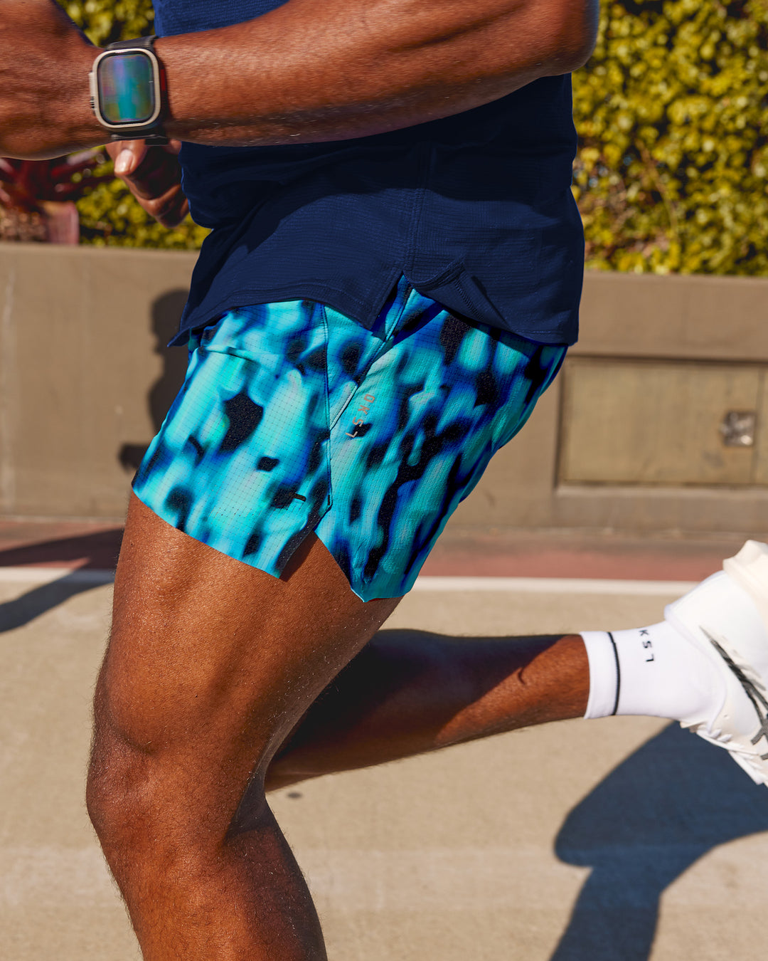 Man wearing UltraAir 5" Lined Performance Short - Luminous | Model:Herve | Size:M - view 2