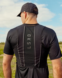 Woman wearing Pace Running Vest - Black-Reflective | Model:Jesse | Size:M/L | Thumbnail Index: 16