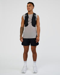 Woman wearing Pace Running Vest - Black-Reflective | Model:Daarian | Size:M/L | Thumbnail Index: 15