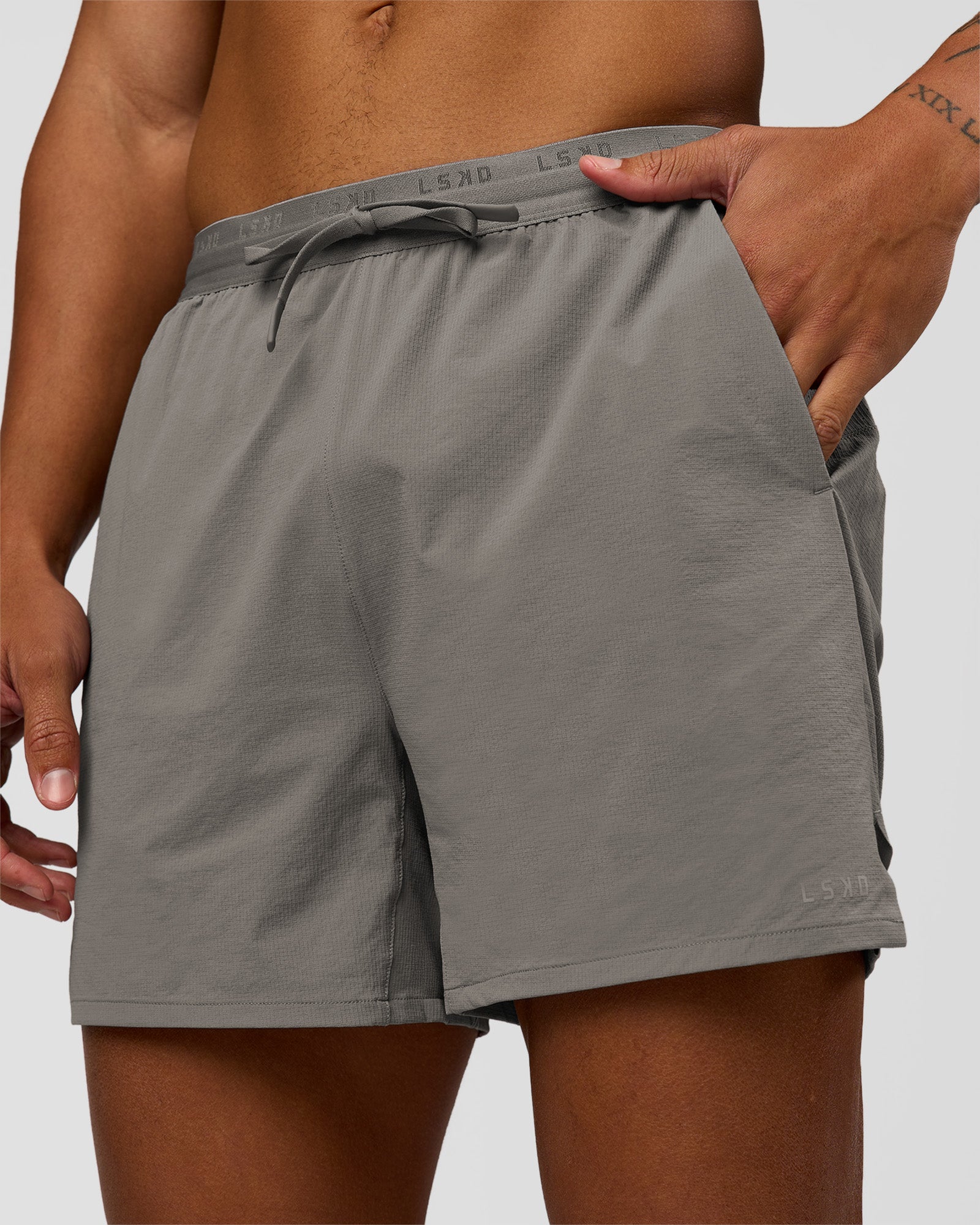 Man wearing Pace 5" Lined Ripstop Short - Storm Front | Model:Malebo | Size:M