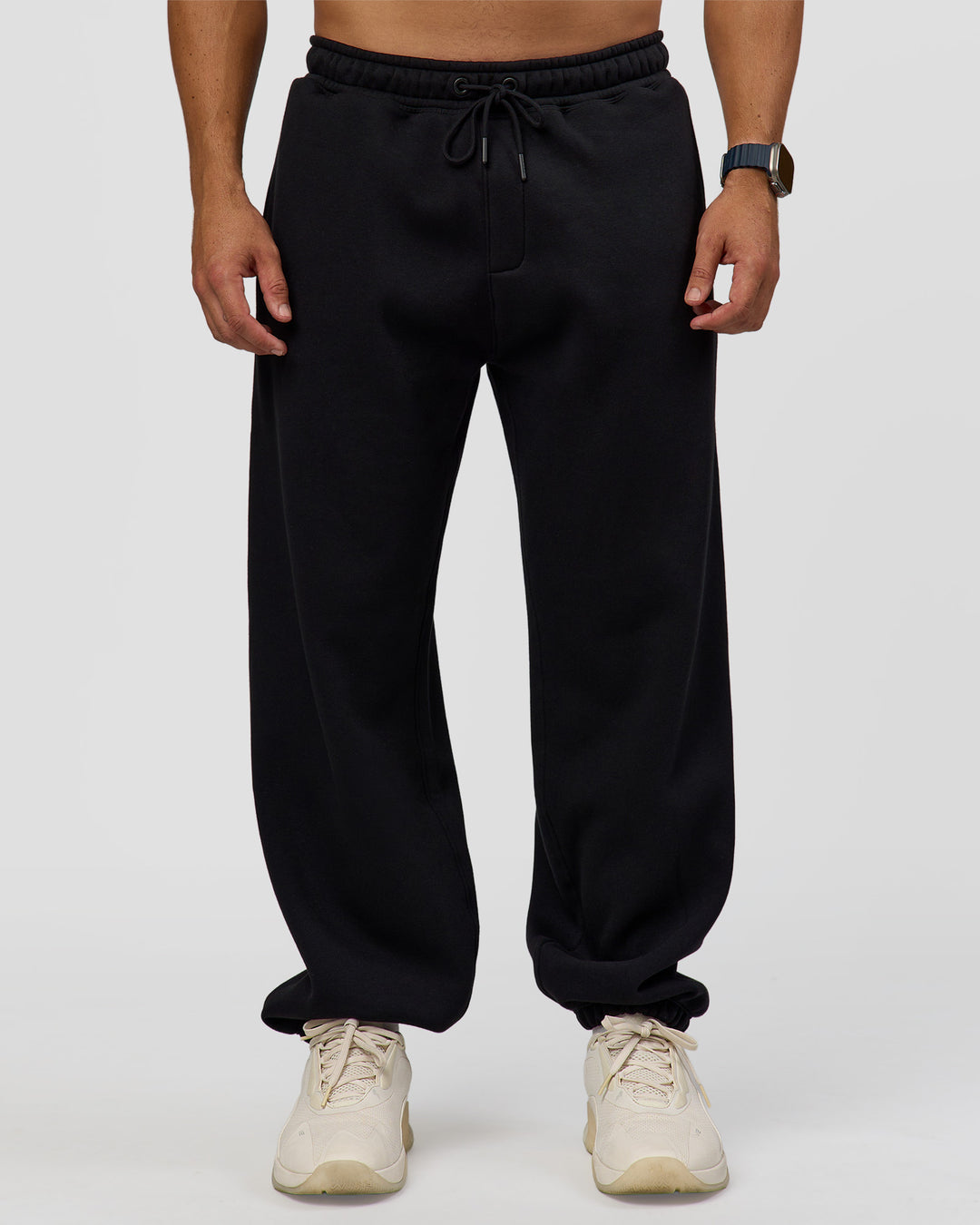 Man wearing Static Grit Baggy Track Pant - Black-Alloy | Model:Jaiden | Size:M - view 6