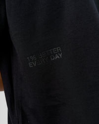 Man wearing 86 V-Neck Oversized Tee - Black-Black | Model:Leandro | Size:M | Thumbnail Index: 4