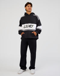 Man wearing A-Team Oversized Hoodie - Caviar-White | Model:George | Size:M | Thumbnail Index: 9