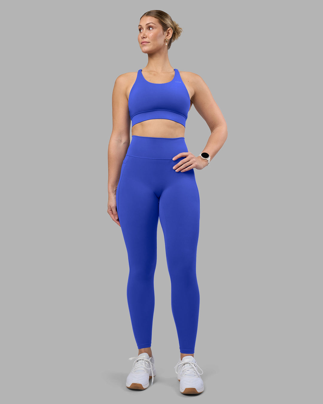 Woman wearing Accelerate Sports Bra - Power Cobalt | Model:Amy | Size:M - view 6