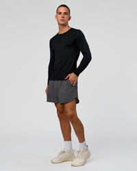 Man wearing AeroFLX+ Seamless Long Sleeve Tee (Set in Sleeve) in Black/Black | Model:Albert | Size:M | Thumbnail Index: 6