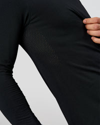Man wearing AeroFLX+ Seamless Long Sleeve Tee (Set in Sleeve) in Black/Black | Model:Albert | Size:M | Thumbnail Index: 8