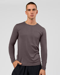 Man wearing AeroFLX+ Seamless Long Sleeve Tee (Set in Sleeve) in Duskstone/Duskstone | Model:Albert | Size:M | Thumbnail Index: 0