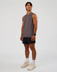 Man wearing AeroFLX+ Seamless Muscle Tank - Duskstone/Duskstone | Model:George | Size:M | Thumbnail Index: 1