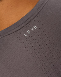 Man wearing AeroFLX+ Seamless Muscle Tank - Duskstone/Duskstone | Model:George | Size:M | Thumbnail Index: 2