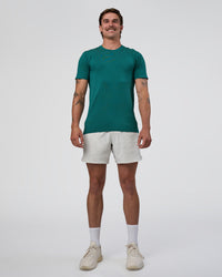 Man wearing AeroFLX+ Seamless Set In Tee - Teal/Teal | Model:Konnor | Size:M | Thumbnail Index: 2