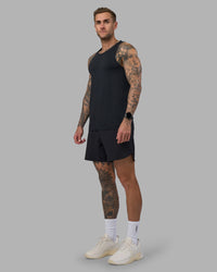 Man wearing AeroFLX+ Seamless Tank - Black Marl | Model:Tommy | Size:M | Thumbnail Index: 4