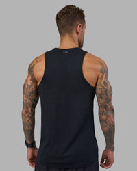 Man wearing AeroFLX+ Seamless Tank - Black Marl | Model:Tommy | Size:M | Thumbnail Index: 2