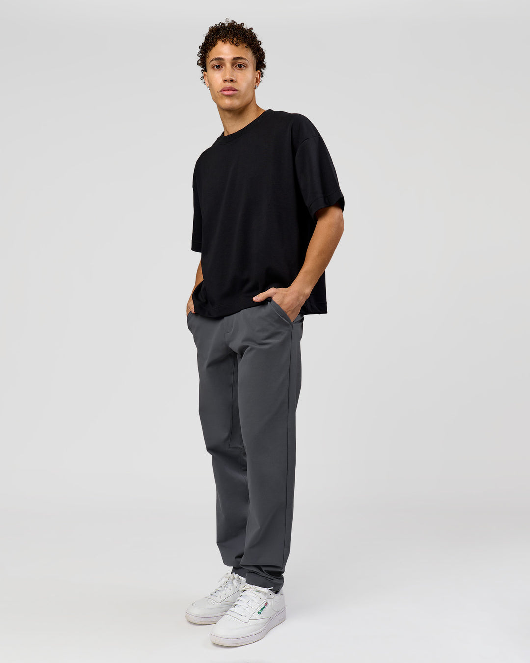 Man wearing AfterDark ZeroCrease Boxy Tee in Black | Model:Leandro | Size:M - view 8