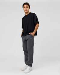 Man wearing AfterDark ZeroCrease Boxy Tee in Black | Model:Leandro | Size:M | Thumbnail Index: 7