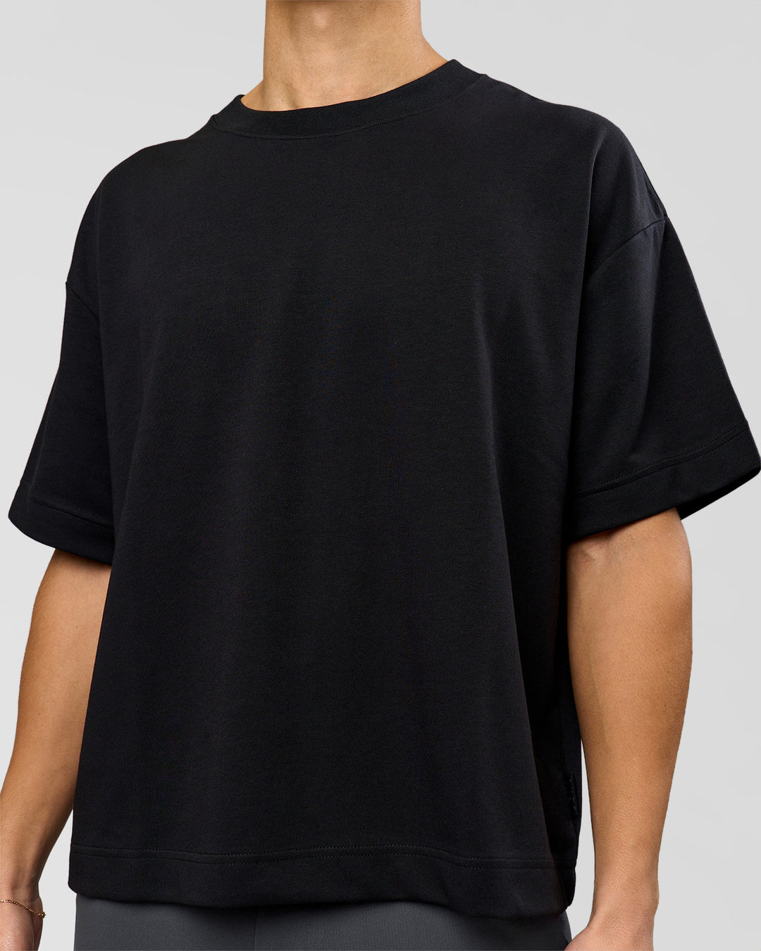Man wearing AfterDark ZeroCrease Boxy Tee in Black | Model:Leandro | Size:M - view 9