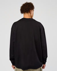 Man wearing AfterDark ZeroCrease Long Sleeve Tee - Black | Model:Leandro | Size:M | Thumbnail Index: 5