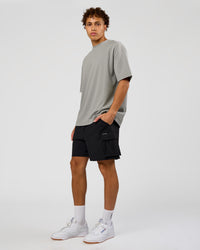 Man wearing AfterDark ZeroCrease Oversized Tee - Alloy | Model:Leandro | Size:M | Thumbnail Index: 7