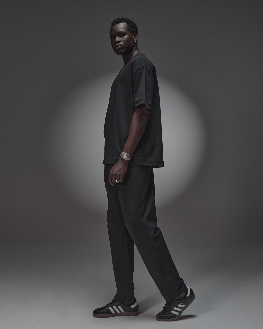 Man wearing AfterDark ZeroCrease Oversized Tee - Black | Model:Mabyro | Size:M - view 3