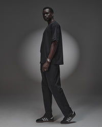 Man wearing AfterDark ZeroCrease Oversized Tee - Black | Model:Mabyro | Size:M | Thumbnail Index: 2