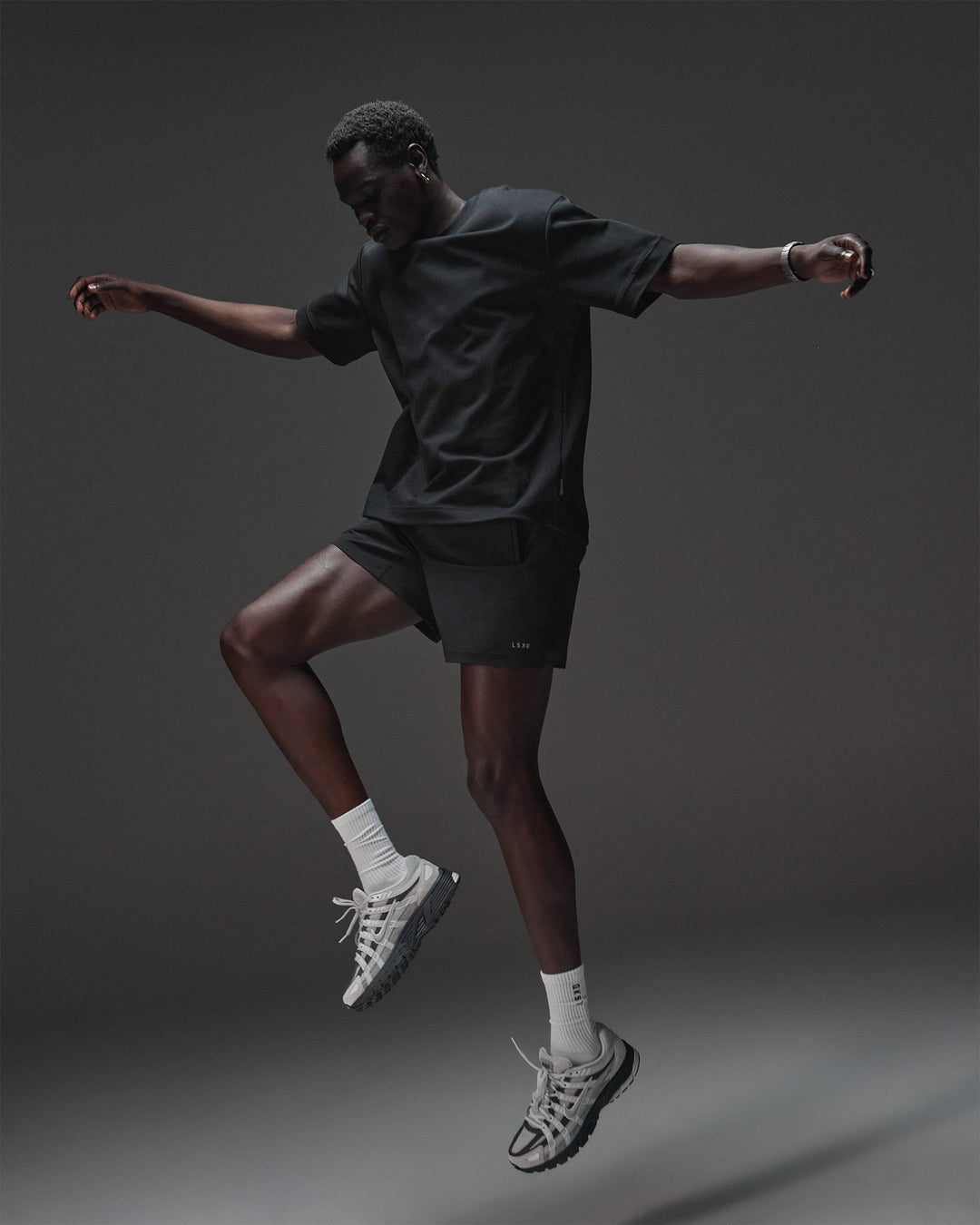 Man wearing AfterDark ZeroCrease Oversized Tee - Black | Model:Mabyro | Size:M - view 5
