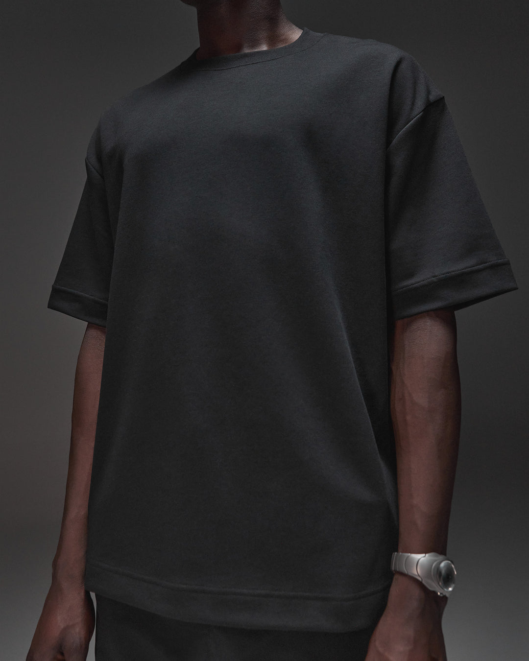 Man wearing AfterDark ZeroCrease Oversized Tee - Black | Model:Mabyro | Size:M - view 12